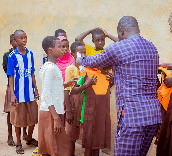 School-uniform-presentation-at-Bugwia-Primary-school-Garu-district